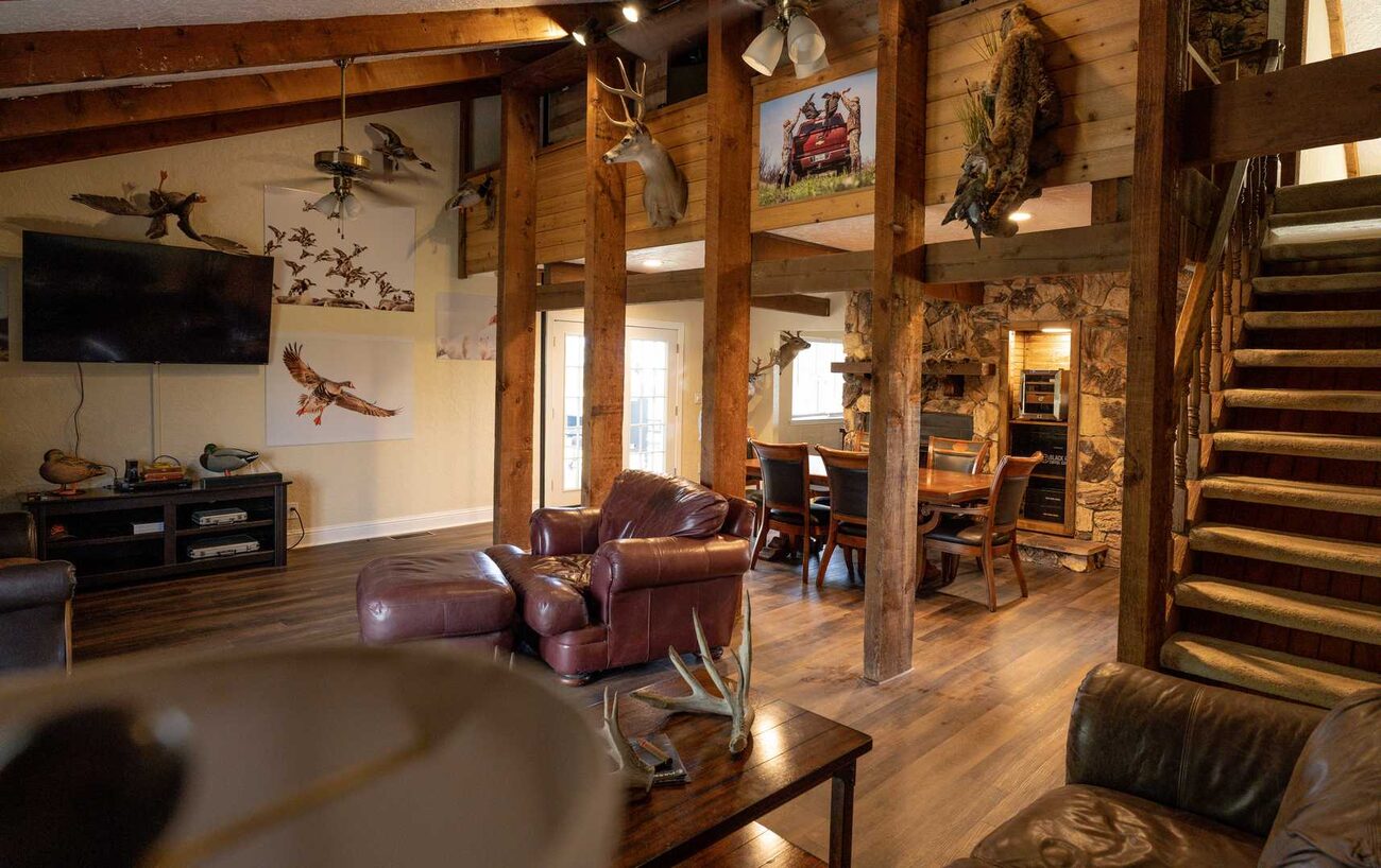 A bedroom by the loft stairs at Pecan Creek